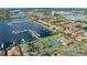 Aerial view of the community featuring a marina, homes, pool, and tennis court at 1512 3Rd Street E Cir, Palmetto, FL 34221