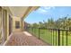 Private balcony view of lush green lawn and trees at 1512 3Rd Street E Cir, Palmetto, FL 34221