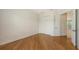 A light-filled bedroom features hardwood floors and a double closet, perfect for an organized space at 1512 3Rd Street E Cir, Palmetto, FL 34221