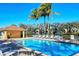 Sparkling pool area with lounge chairs and an adjacent pool house, offering a relaxing retreat at 1512 3Rd Street E Cir, Palmetto, FL 34221