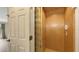 A residential elevator with folding doors and an emergency telephone at 1512 3Rd Street E Cir, Palmetto, FL 34221