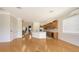 Hardwood floors and an open layout highlight the living, dining, and kitchen areas at 1512 3Rd Street E Cir, Palmetto, FL 34221