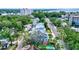 Enjoy the neighborhood views from above, with mature trees and a putting green and pool featured in the backyard at 1523 1St W Ave, Bradenton, FL 34205