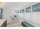 Bright and spacious laundry room with built-in shelving and ample storage at 1523 1St W Ave, Bradenton, FL 34205