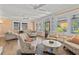 Bright and airy living room with hardwood floors and plenty of natural light at 1523 1St W Ave, Bradenton, FL 34205