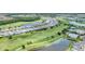 Panoramic aerial showcasing homes bordering a golf course with ponds and winding paths at 15813 San Lazzaro Ave, Bradenton, FL 34211