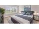 Calming bedroom with large window and nature view at 15813 San Lazzaro Ave, Bradenton, FL 34211