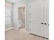 Bedroom featuring a closet and a bathroom with frameless glass shower at 15813 San Lazzaro Ave, Bradenton, FL 34211