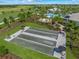 Aerial view of three bocce ball courts in a beautifully landscaped community at 15813 San Lazzaro Ave, Bradenton, FL 34211