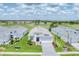 An aerial view of a beautifully landscaped single-Gathering home on a large lot at 15813 San Lazzaro Ave, Bradenton, FL 34211