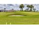 Scenic golf course view from the home, featuring lush greenery and sand traps at 15813 San Lazzaro Ave, Bradenton, FL 34211