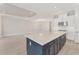 Bright and spacious kitchen with a large island perfect for cooking and gathering at 15813 San Lazzaro Ave, Bradenton, FL 34211