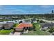 Beautiful single-Gathering home boasting a tile roof and lovely pond view, perfect for serene living at 1677 Fleetwood Dr, Sarasota, FL 34232