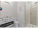 Contemporary bathroom featuring a vanity with sink, toilet, and glass-enclosed shower at 17204 Bullhorn Cir, Punta Gorda, FL 33982