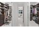 Large walk-in closet with custom shelving and ample storage space for clothing and accessories at 17204 Bullhorn Cir, Punta Gorda, FL 33982