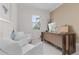 Cozy office with a modern desk and comfortable seating area at 17204 Bullhorn Cir, Punta Gorda, FL 33982