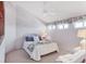 Cozy bedroom with a queen sized bed and floral accents at 175 Inlets Blvd # 175, Nokomis, FL 34275