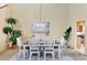 Formal dining room featuring neutral walls, light fixture, a table with six chairs, and decor at 175 Inlets Blvd # 175, Nokomis, FL 34275