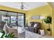 Bright living room showcasing natural light, comfortable seating, and views of the outdoors at 175 Inlets Blvd # 175, Nokomis, FL 34275