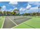 Well-maintained tennis courts with net and lighting for day or night play at 175 Inlets Blvd # 175, Nokomis, FL 34275