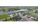 Aerial view of a home in a community with lakes and lush landscaping at 17817 Pastureland Ave, Lakewood Ranch, FL 34211