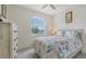Cozy bedroom featuring lots of natural light and a large window at 17817 Pastureland Ave, Lakewood Ranch, FL 34211