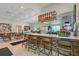 Community cafe area with a breakfast bar and dining tables, perfect for residents to relax and socialize at 17817 Pastureland Ave, Lakewood Ranch, FL 34211