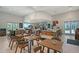 Charming cafe with breakfast bar and dining area for community residents, ideal for casual gatherings at 17817 Pastureland Ave, Lakewood Ranch, FL 34211