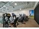 Gym featuring multiple workout machines and an upstairs area at 17817 Pastureland Ave, Lakewood Ranch, FL 34211