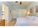 Well-lit bedroom with closet, ensuite access, and ceiling fan at 20207 71St E Ave, Bradenton, FL 34211