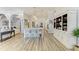 Spacious kitchen with island, bar seating, and custom white cabinets at 20207 71St E Ave, Bradenton, FL 34211