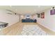Relaxing entertainment area with a TV and entertainment center, and a large sectional sofa at 20207 71St E Ave, Bradenton, FL 34211