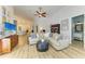 Well-lit living room featuring backyard access and open floor plan at 20207 71St E Ave, Bradenton, FL 34211