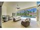 Covered lanai featuring wicker furniture and views of the screened pool at 20207 71St E Ave, Bradenton, FL 34211