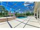 The pool area features steps into the pool and is enclosed in a screened in patio, perfect for year-round enjoyment at 20207 71St E Ave, Bradenton, FL 34211