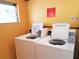 Clean community laundry room with modern machines at 2155 Wood St # A26, Sarasota, FL 34237