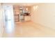 The layout of this living area allows for the kitchen and dining area to be easily accessible at 2155 Wood St # A26, Sarasota, FL 34237