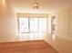 This spacious living room offers plenty of natural light, with sliding doors and easy access to the screened in patio at 2155 Wood St # A26, Sarasota, FL 34237