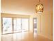 The open-concept living area offers clean sight lines to the screened in patio and easy access to other rooms at 2155 Wood St # A26, Sarasota, FL 34237
