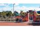 A colorful and inviting community playground, perfect for families, complete with unique circus-themed elements at 2155 Wood St # A26, Sarasota, FL 34237