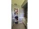Bathroom featuring sink, cabinets, and linen closet at 23067 Elmira Blvd, Punta Gorda, FL 33980