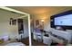 Bedroom with natural lighting, laminate floors, and modern decor at 23067 Elmira Blvd, Punta Gorda, FL 33980