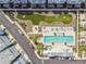 Bird's eye view showcasing the community pool, a putting green, and luxurious outdoor lounge areas at 2500 Boone Ct, Sarasota, FL 34237
