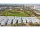 Stunning aerial view shows an impressive community near a lush park and the downtown skyline at 2500 Boone Ct, Sarasota, FL 34237