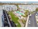 Beautiful aerial view of condos with a pool and lounge area at 2500 Boone Ct, Sarasota, FL 34237
