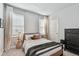 Bedroom with a modern style featuring natural light and neutral colors at 2500 Boone Ct, Sarasota, FL 34237