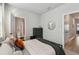 Comfortable bedroom with an ensuite bathroom, two closets, and neutral decor at 2500 Boone Ct, Sarasota, FL 34237