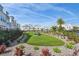Inviting community green space featuring picnic tables and lush landscaping at 2500 Boone Ct, Sarasota, FL 34237