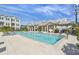 Beautiful community pool features clear water, lounge chairs, and a stunning community building at 2500 Boone Ct, Sarasota, FL 34237