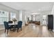 Open-concept living space with a cozy dining room set to the left at 2500 Boone Ct, Sarasota, FL 34237